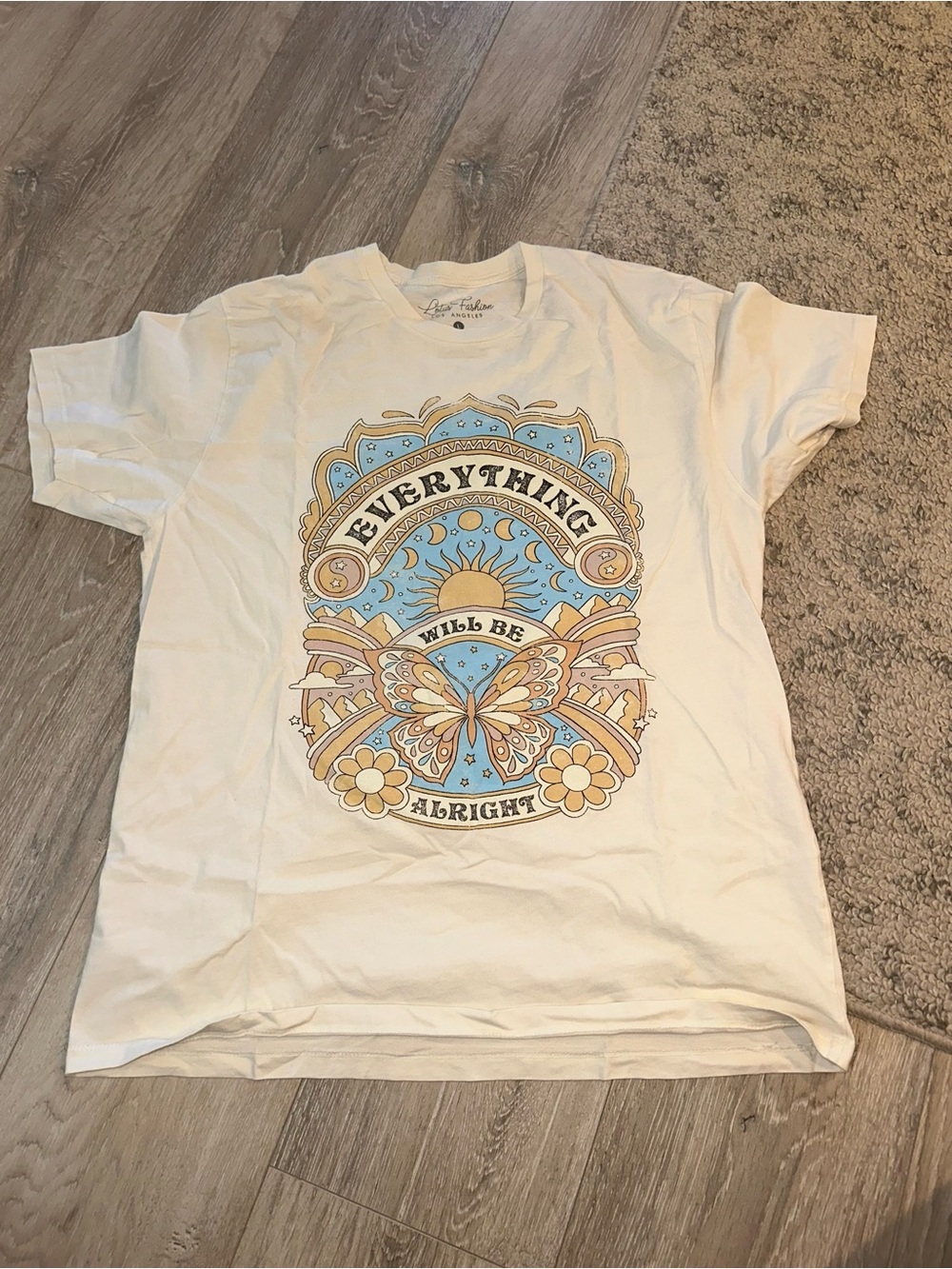 Woman’s White Graphic Tee — 'Everything Will Be Alright'